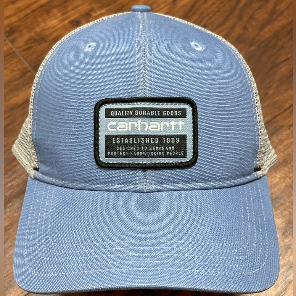 New, never worn Carhartt trucker hat, multi-size, light blue and gray in color.